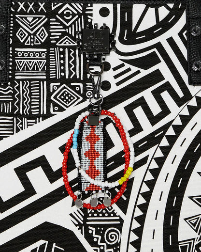Sprayground A.I. AFRICAN INTELLIGENCE THE SKYHAWK WING TOTE - SANDFLOWER COLLAB